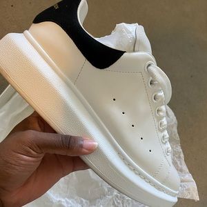 Size 37.5 black/white Alexander McQueen sneakers. Gently used,great condition